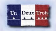 logo-un-deux-trois - LeFrancophile